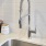 a sink and a faucet in a bathroom