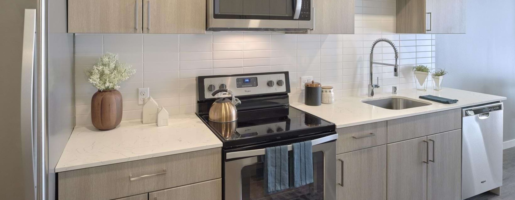 a kitchen with stainless steel appliances
