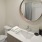 a bathroom with a large mirror