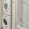 a washing machine and dryer in a room