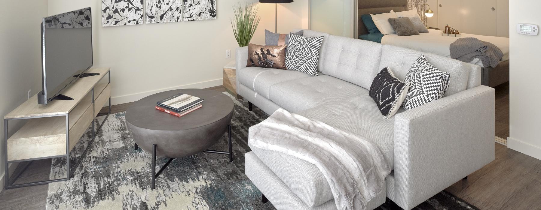 a living room with a couch and a coffee table