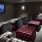 a room with couches and a tv