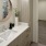 a bathroom with a large mirror
