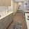 a kitchen with marble counters