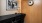office with seating desk and art on a wall