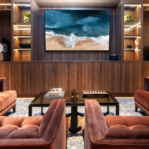 lounge with seating table and tv