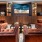 lounge with seating table and tv