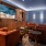 lounge with seating table and tv