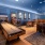 Game room with shuffleboard table and pinball machine