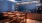 bar area with seating and kitchen