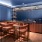bar area with seating and kitchen