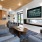 lounge area with seating fireplace and a tv