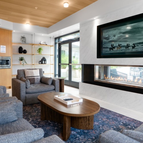 lounge area with seating fireplace and a tv