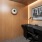 office with seating desk and art on a wall