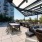 a patio with chairs and tables