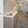 a kitchen with a bed and a sink