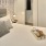 a bed with a white bed spread