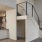 a kitchen with white cabinets