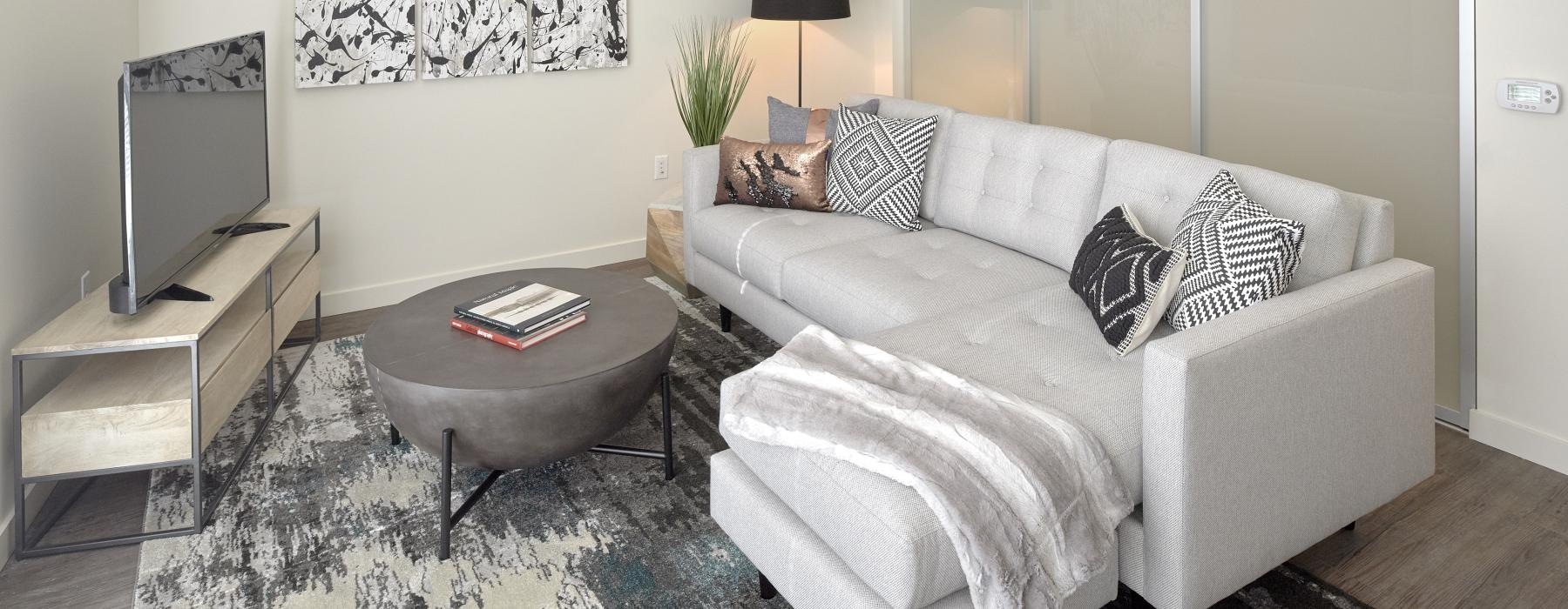 a living room with a couch and a coffee table